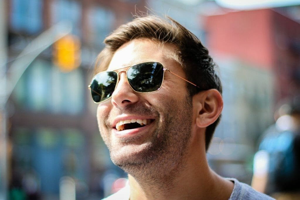 Man with sunglasses on smiling