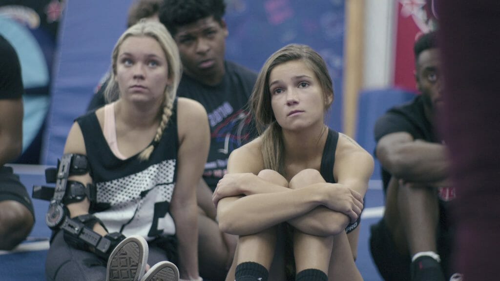 Cheerleaders sitting