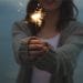 A girl holding a sparkler