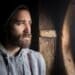 Living With Regret How to Get Over Regret man looking out window